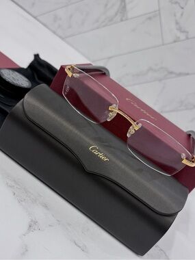Cartier SUNGLASSES WITH ELONGATED C
DE CARTIER MOTIF